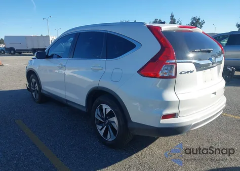 2016 Honda Cr-V Touring z USA, uszkodzony, nr VIN 5J6RM3H91GL016095